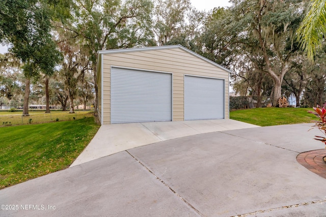 garage with a lawn