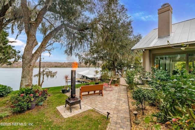 exterior space with a water view