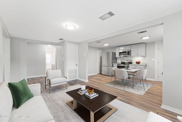 living room featuring light hardwood / wood-style flooring