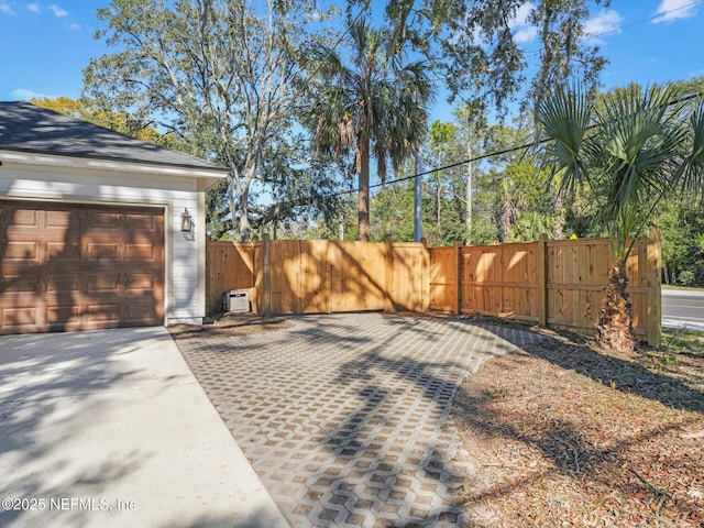 view of yard with a garage