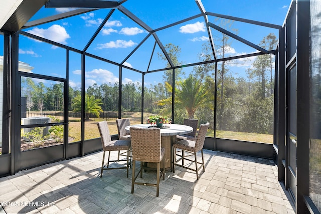 sunroom / solarium with a healthy amount of sunlight