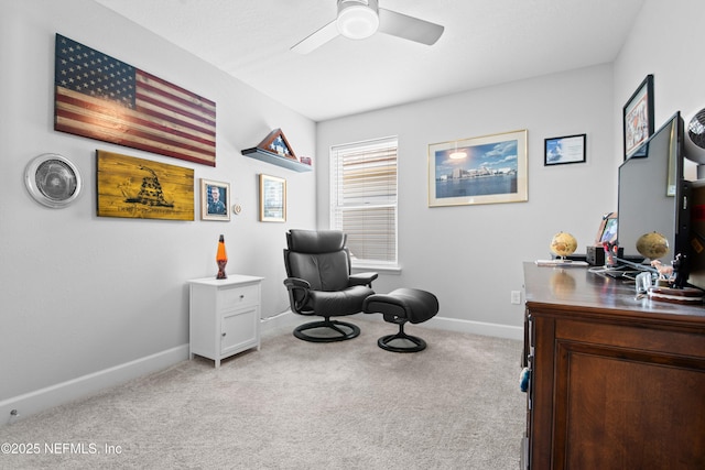 office with light carpet and ceiling fan