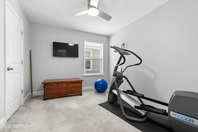 workout room featuring ceiling fan and light carpet