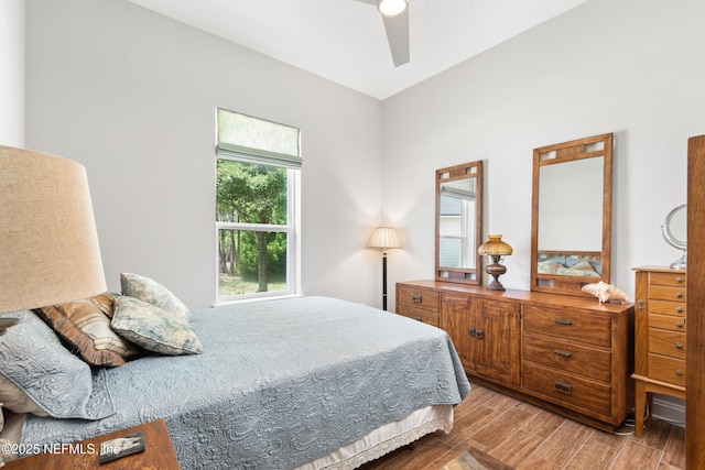 bedroom featuring light wood finished floors and ceiling fan