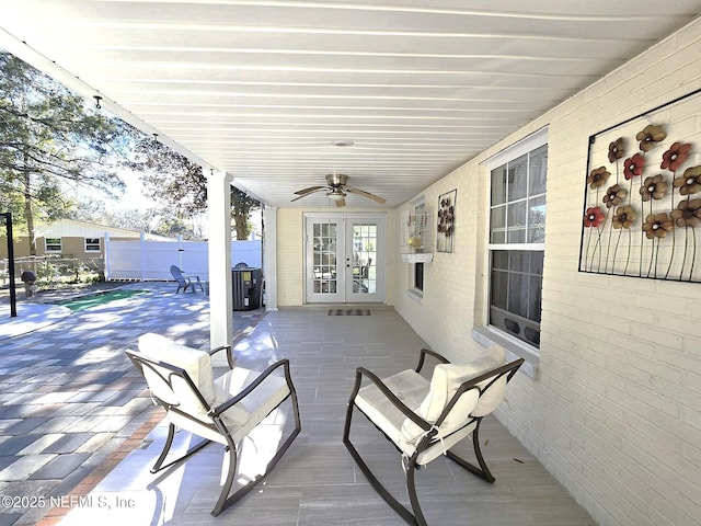 view of patio with french doors and ceiling fan