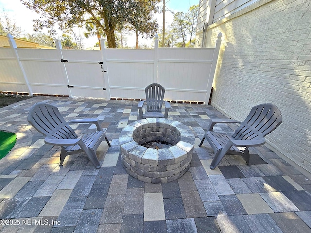 view of patio featuring a fire pit