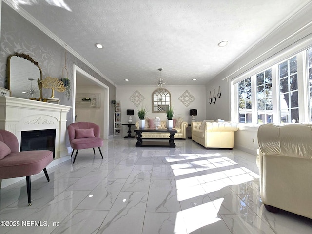 living room with ornamental molding and a textured ceiling