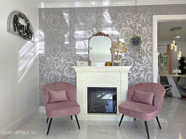 sitting room featuring crown molding