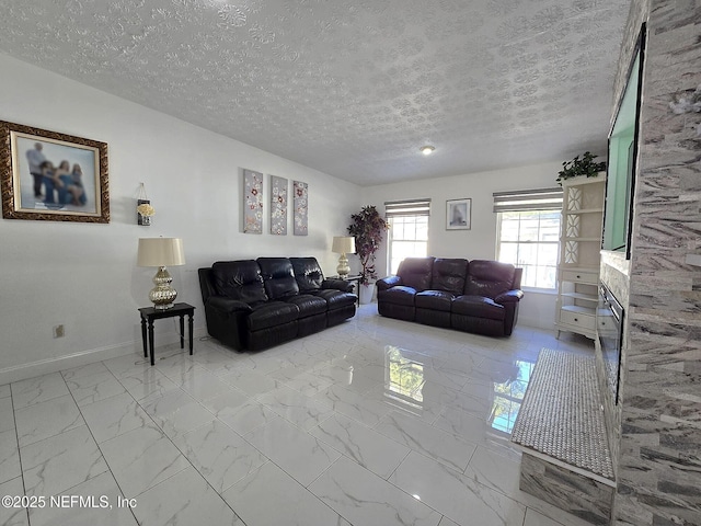 living room with a textured ceiling