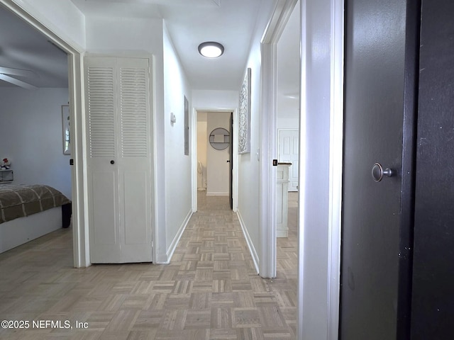 hall with light parquet floors