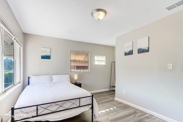 bedroom featuring hardwood / wood-style floors