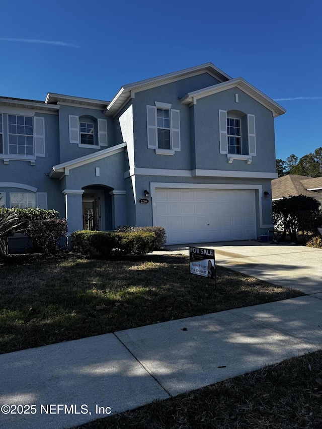 view of front facade featuring a garage