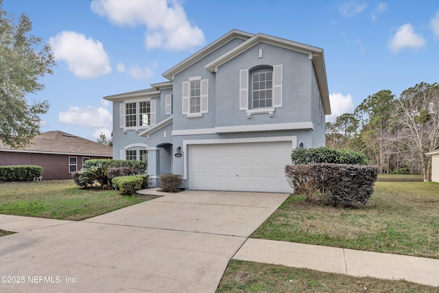 view of property featuring a garage and a front yard