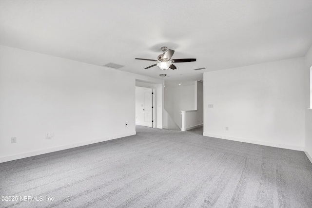 unfurnished room featuring ceiling fan and carpet flooring