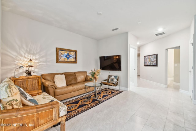 living room with light tile patterned floors