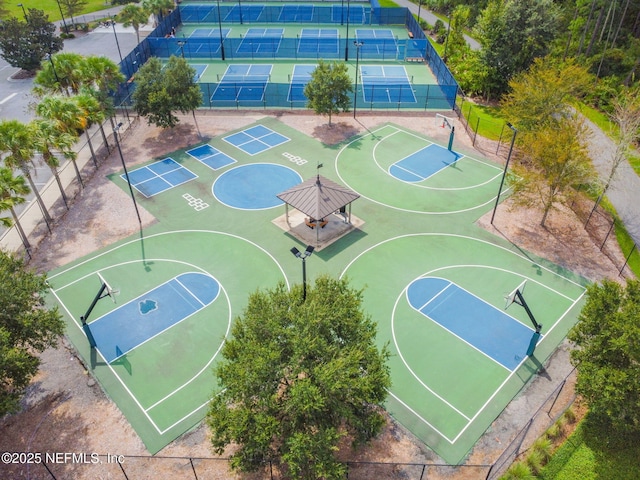 view of basketball court featuring tennis court and a gazebo