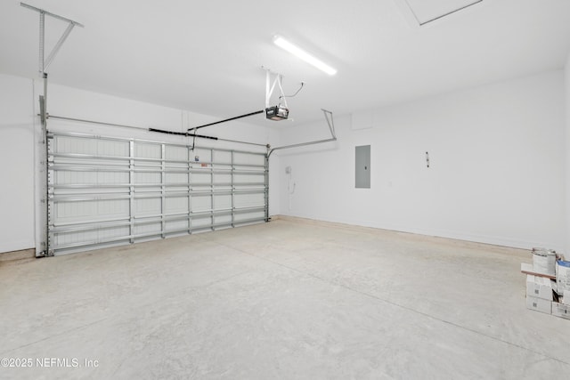 garage featuring a garage door opener and electric panel