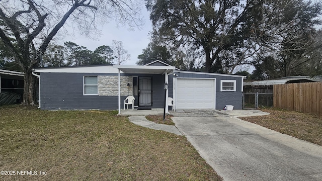 single story home with a garage and a front yard