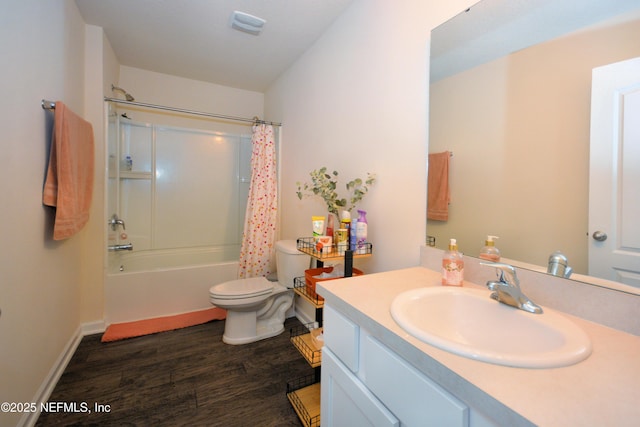 full bathroom featuring toilet, wood-type flooring, shower / bathtub combination with curtain, and vanity