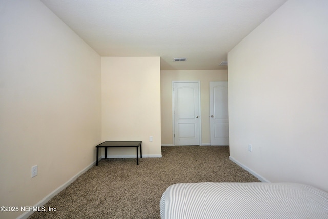 bedroom featuring carpet flooring