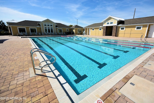 view of pool featuring a patio