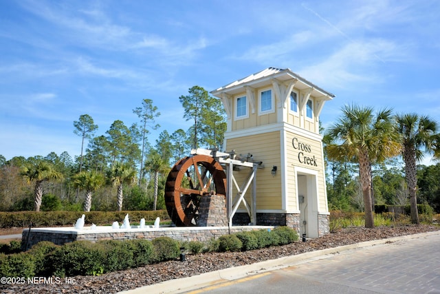 view of community sign