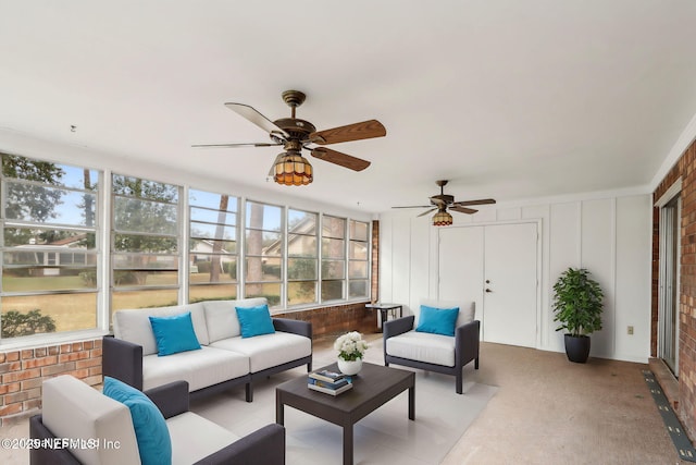 sunroom / solarium with ceiling fan