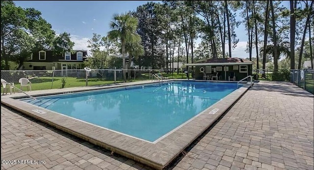 view of pool with a patio