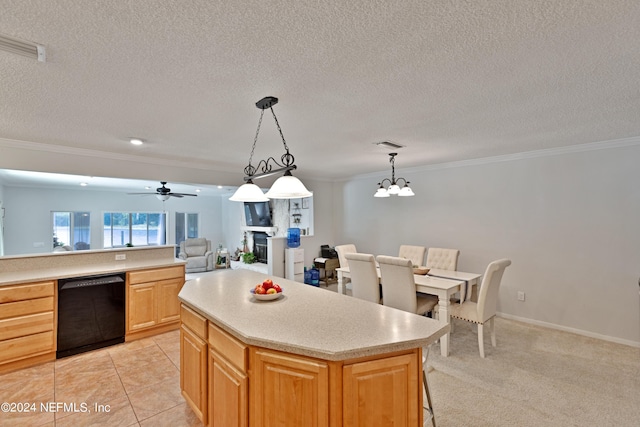 kitchen featuring ceiling fan with notable chandelier, a center island, black dishwasher, hanging light fixtures, and crown molding