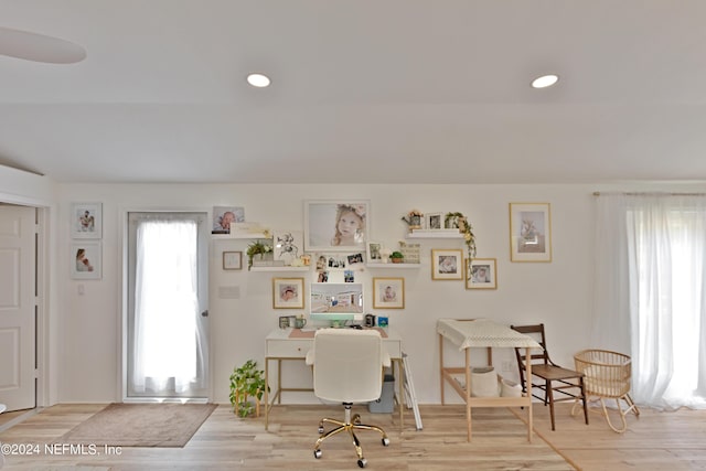 office with light hardwood / wood-style flooring