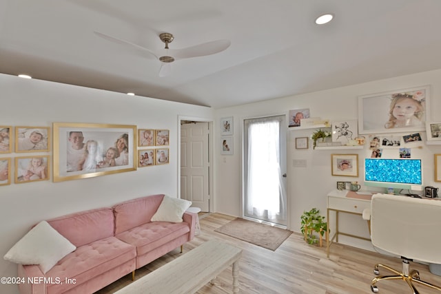 office area with vaulted ceiling, ceiling fan, and light hardwood / wood-style flooring