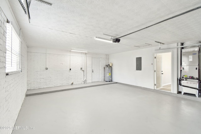 garage featuring water heater, heating unit, a garage door opener, and electric panel