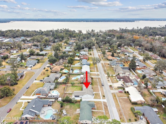 aerial view featuring a residential view and a water view