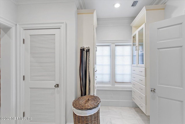 bathroom featuring crown molding