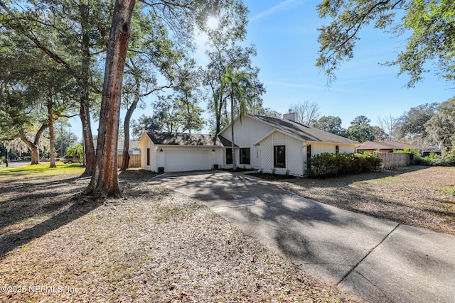 view of front of property with a garage