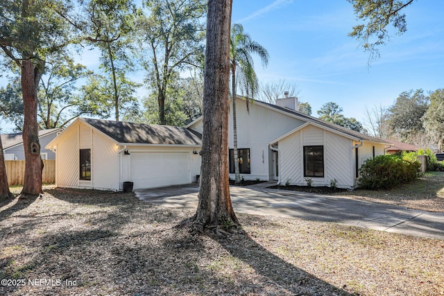 view of property exterior with a garage