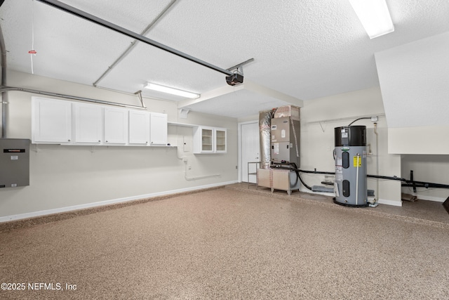 garage featuring heating unit, a garage door opener, and heat pump water heater