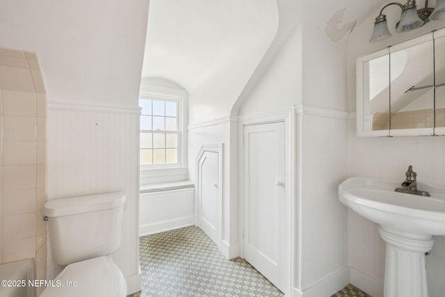 bathroom featuring sink and toilet