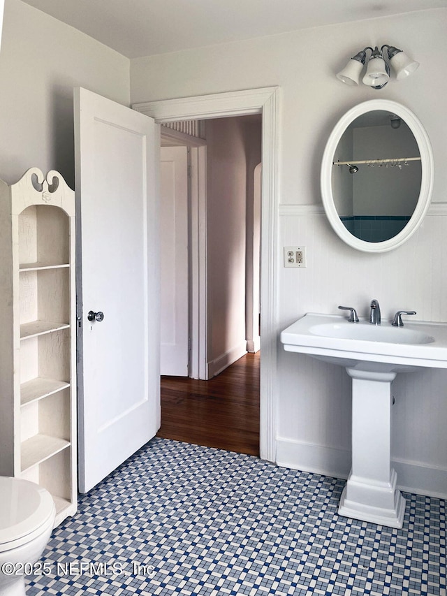 bathroom featuring toilet