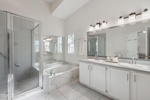 bathroom featuring tile patterned floors, vanity, and independent shower and bath