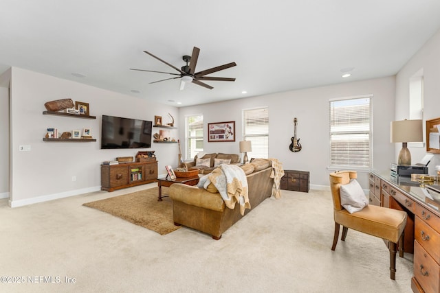 living room with light colored carpet and ceiling fan