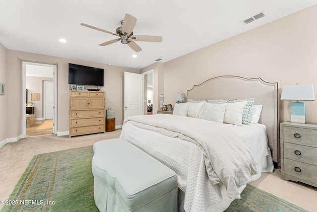 bedroom featuring light colored carpet and ceiling fan