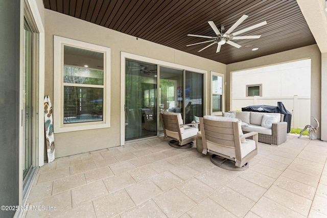 view of patio with ceiling fan