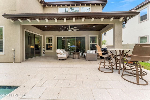 view of patio featuring ceiling fan