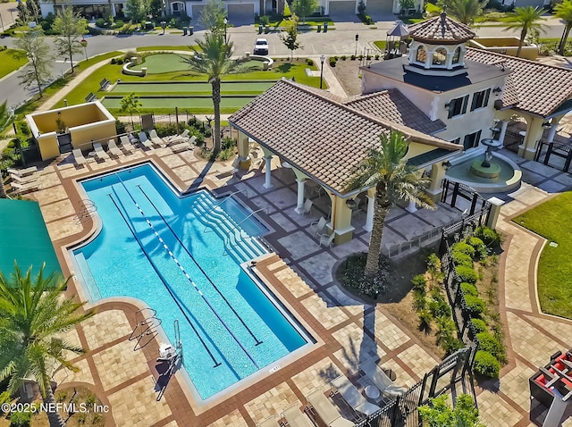 view of swimming pool with a patio and a gazebo