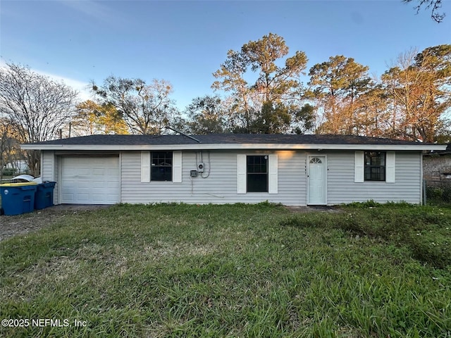 rear view of property with a yard