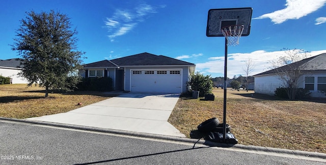 view of front of property with a front lawn and a garage