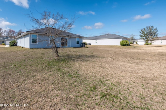 exterior space with a yard