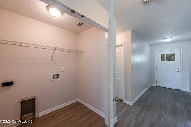 laundry room with visible vents, laundry area, baseboards, hookup for a washing machine, and dark wood-style flooring