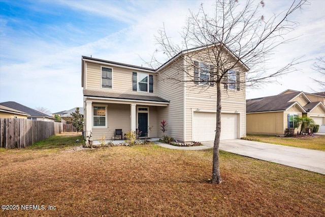 front of property featuring a garage and a front lawn